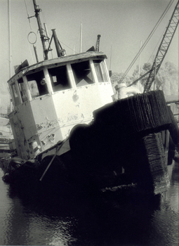 Boat wreck - 35mm high speed infrared hand processed negative film and hand printed warmtone fiber print 35mm high speed infrared hand processed negative film and hand printed warmtone fiber print